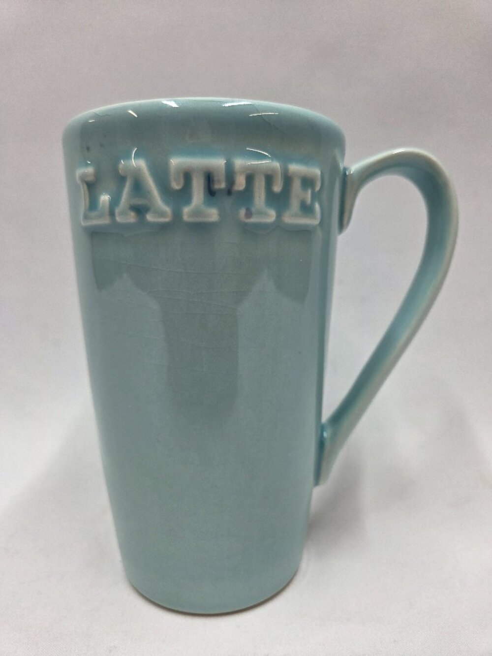 Primagera Latte Embossed  Tall Mug Teal 16 Ounce Grackle Design.